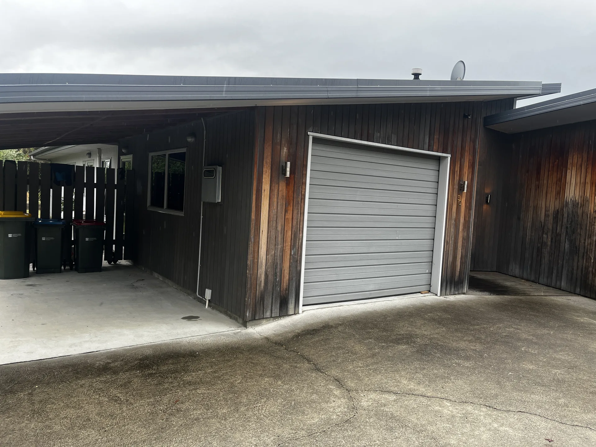Cedar Exterior Restoration and Stain Refresh in Wānaka - Before 5: Weathered Cedar Garage Side Before Restoration Albert Town