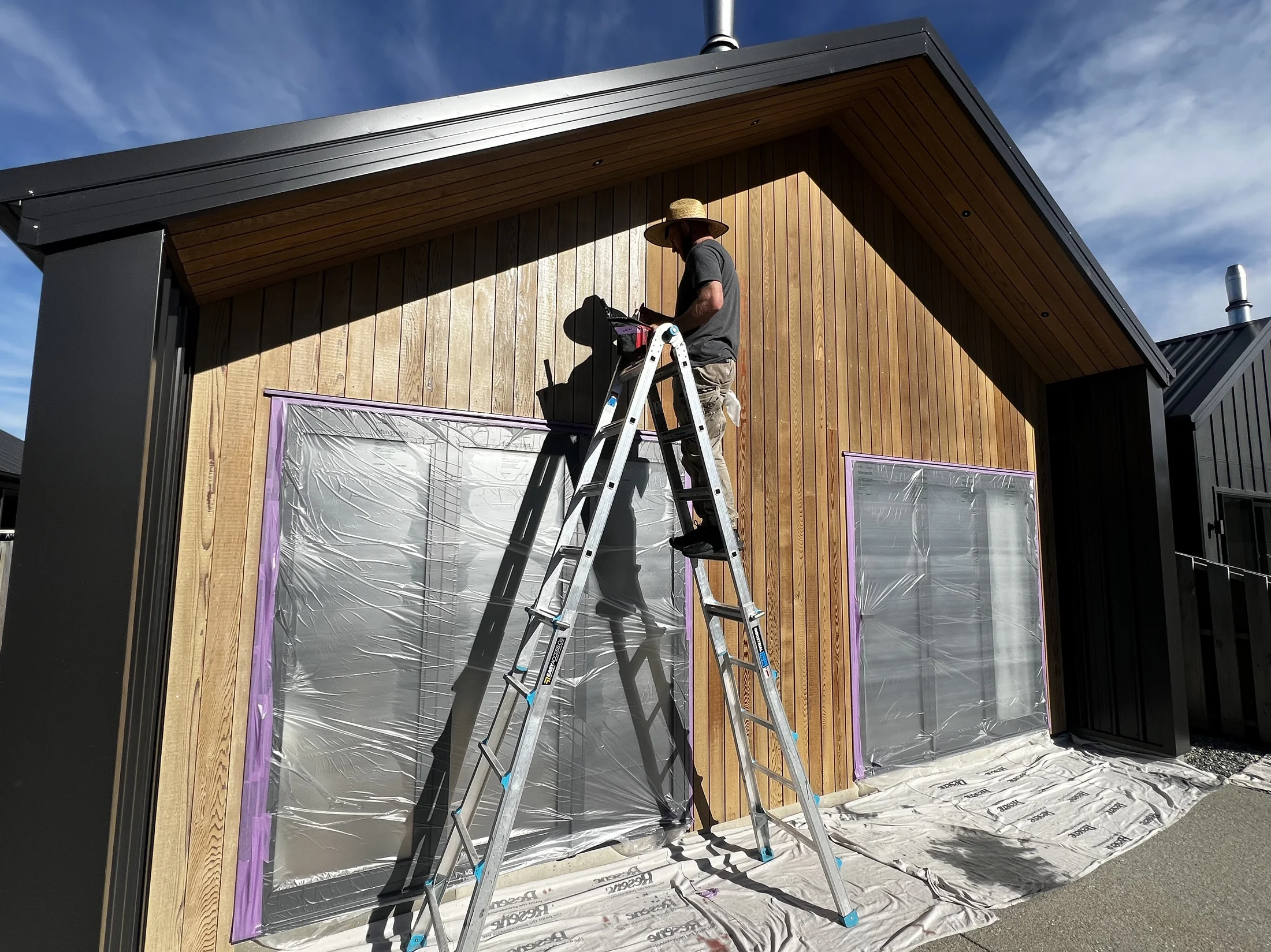 Cedar Oil Refresh in Northlake, Wānaka - Process 4: Masking Windows Before Cedar Staining Northlake Wanaka