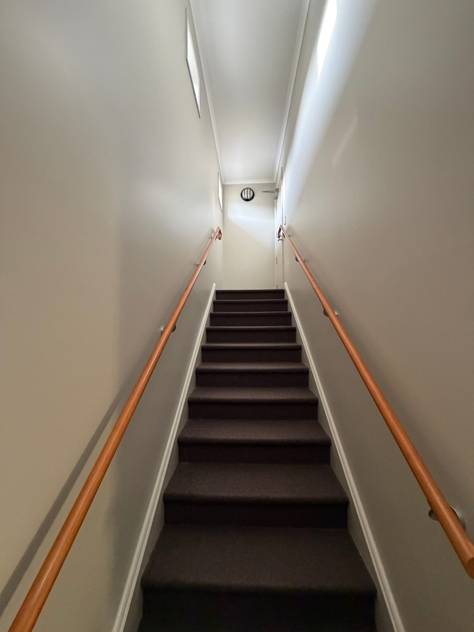 Cromwell Races Admin Building - After 3: Interior Stairwell Freshly Painted Cream Walls Ceiling