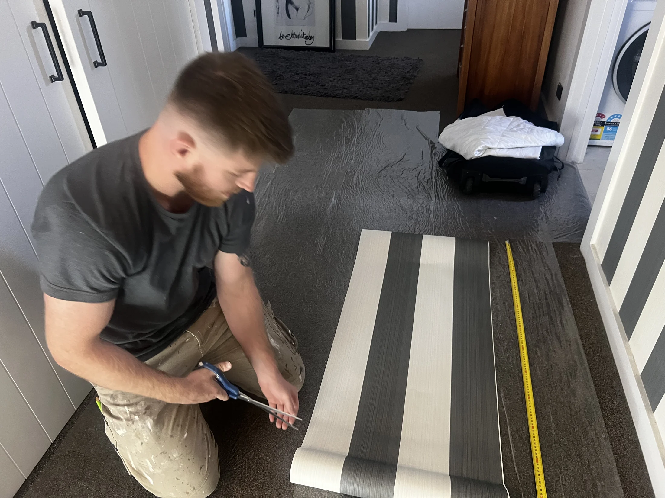 Interior Repaint & Wallpaper, Wanaka - Process 1: Cutting Striped Wallpaper Hallway Wanaka