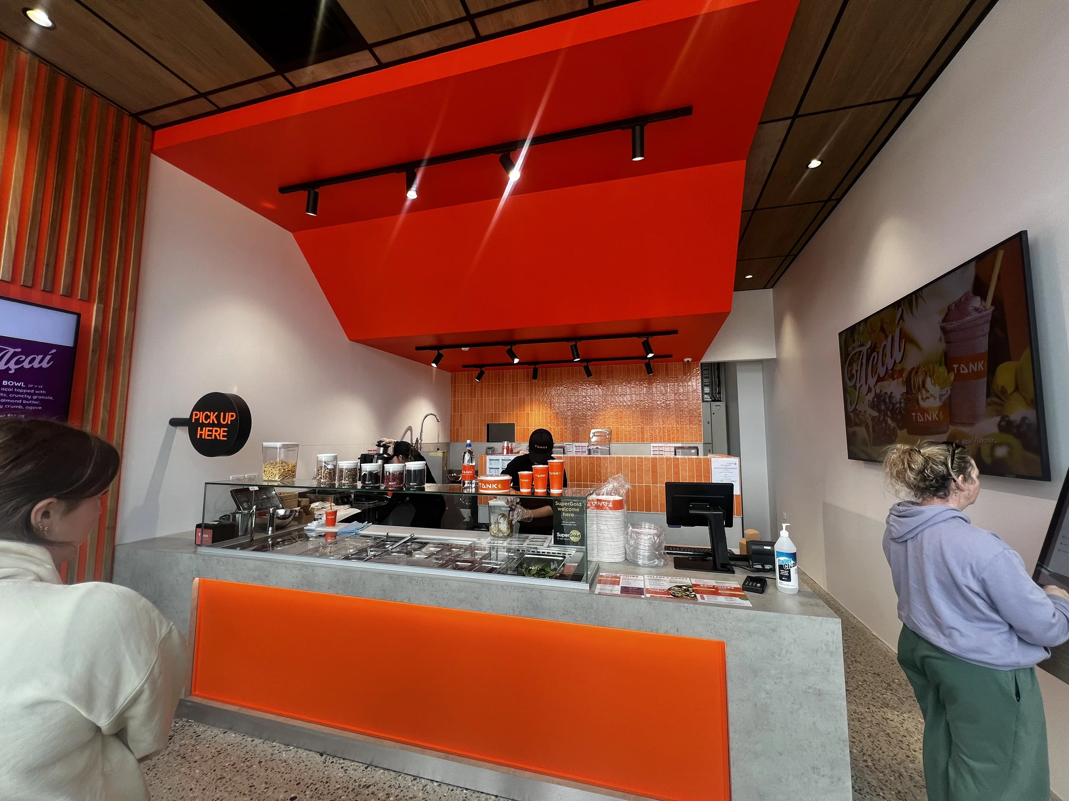 Tank Store Fitout, Three Parks Wanaka - After 1: Completed Tank Store Counter And Orange Ceiling Three Parks Wanaka